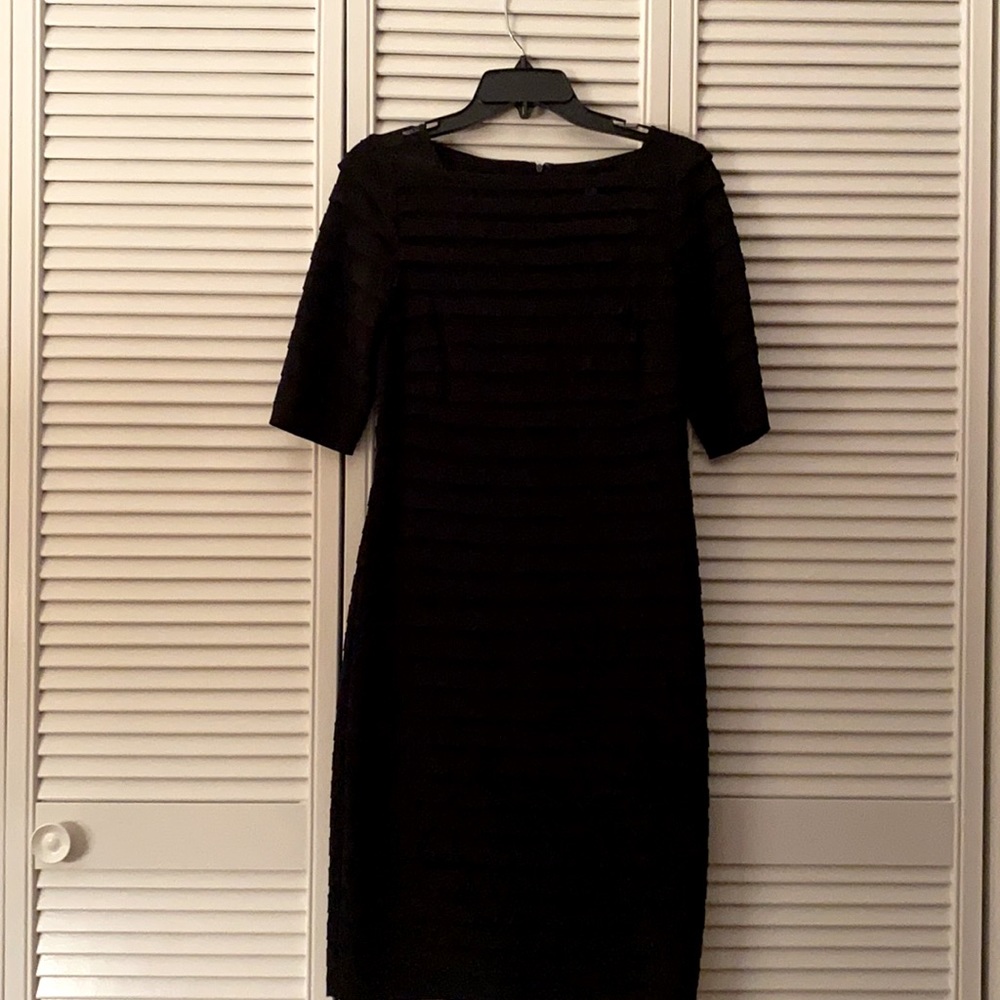 Black tailored cocktail dress with ribbed detail